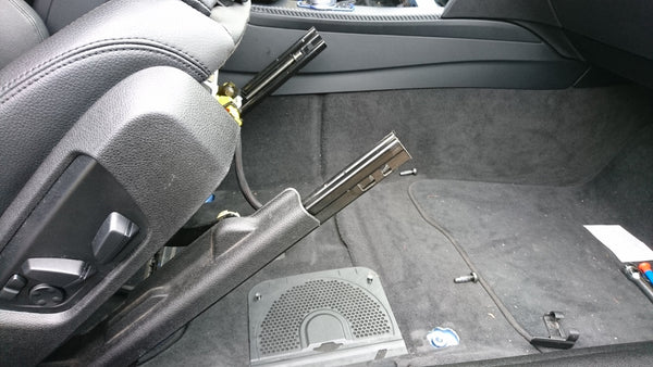 A vehicle seat partially removed