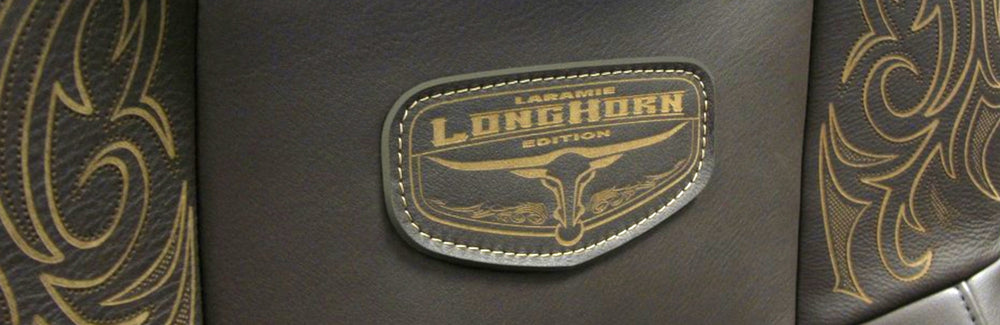 Ram Laramie Longhorn Seat Logo with tooled leather